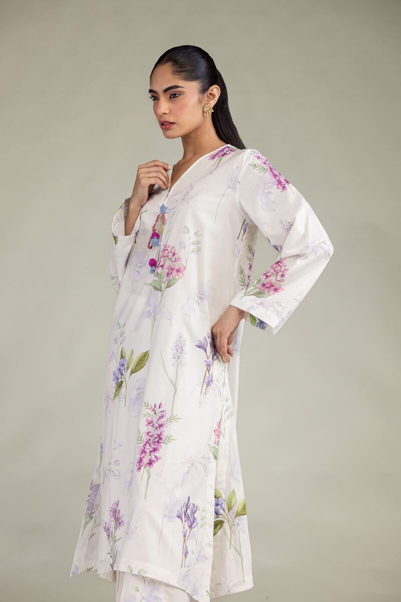 Model wearing Maison Jai ivory floral kurta
